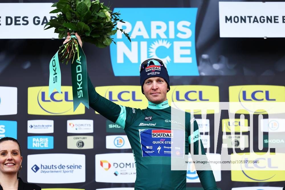 Belgian Tim Merlier of Soudal Quick-Step celebrates on the podium in the green jersey of leader in the sprint ranking after stage four of the 83th edition of the Paris-Nice cycling race, 163,4km from Vichy to La Loge des Gardes, France, Wednesday 12 March 2025. DAVIDxPINTENS x114783777x