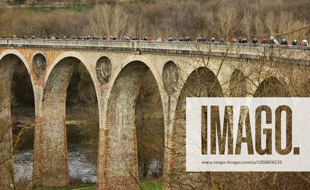 The pack of riders pictured in action during stage five of the 83th edition of the Paris-Nice cycling race, 196,5 km from Saint-Just-en-Chevalet to La Cote-Saint-Andre, France, Thursday 13 March 2025. DAVIDxPINTENS x114853496x