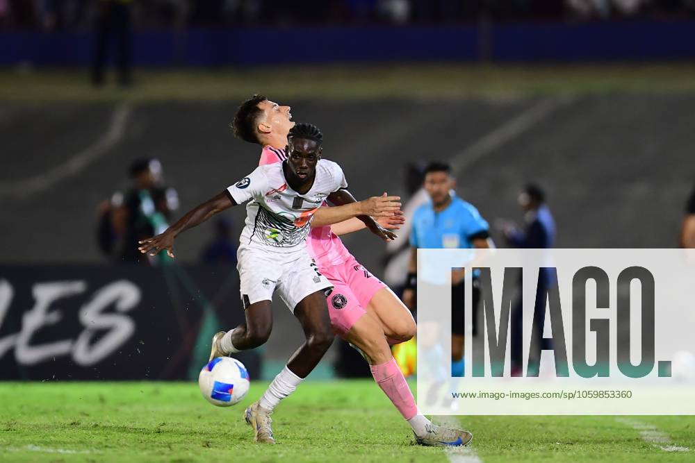 Concacaf Champions Cup 2025 Cavalier vs Inter Miami Tadeo Allende (L) of Inter Miami fights for the ball with Jerome Mcleary (R) of Cavalier during the round of 16 second leg match between Cavalier and Inter Miami as part of the CONCACAF Champions Cup 2025, at National Stadium on March 13, 2025 in Kingston, Jamaica. KINGSTON JAMAICA JAMAICA
