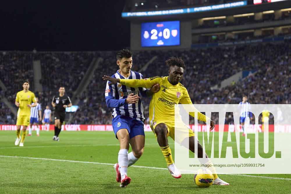 FC Porto v AVS - Liga Portugal Betclic Andre Franco of FC Porto competes for the ball with Tunde Akinsola of AVS Futebol during the Liga Portugal Betclic match between FC Porto and AVS Futebol at Estadio Do Dragao in Porto, Portugal, on March 15, 2025. Porto, Portugal Portugal
