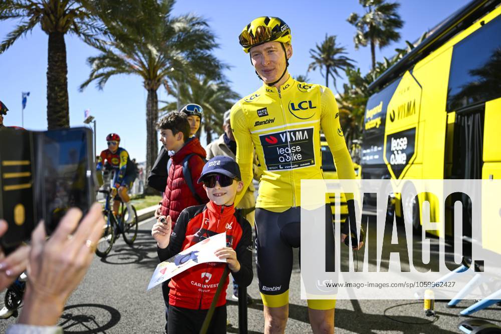 Paris - Nice 2025 - stage 8 NICE, FRANCE - MARCH 16 : Jorgenson Matteo (USA) of Team Visma Lease A Bike with a young fan before the start of the race during stage 8 and final stage of the 83th edition of the Paris - Nice cycling race, a stage of 119,9km with start and finish in Nice on March 16, 2025 in Nice, France, 16 03 2025 ( Motordriver Kenny Verfaillie - Nice France