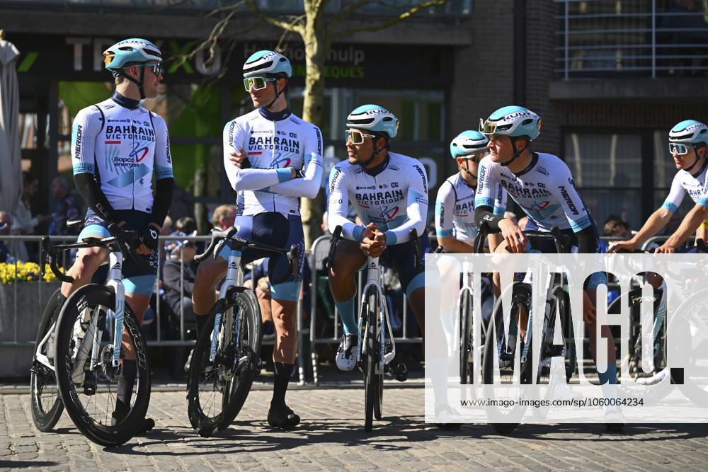 Danilith Nokere Koerse 2025 cycling race NOKERE, BELGIUM - MARCH 19 : riders of Bahrain - Victorious during the Men Elite UCI 1.Pro 78th Danilith Nokere Koerse cycling race with start in Deinze and finish in Nokere (188,2 km) on March 19, 2025 in Nokere, Belgium, 19 03 2025 ( Motordriver Rodrique Verfaillie & Nokere Belgium