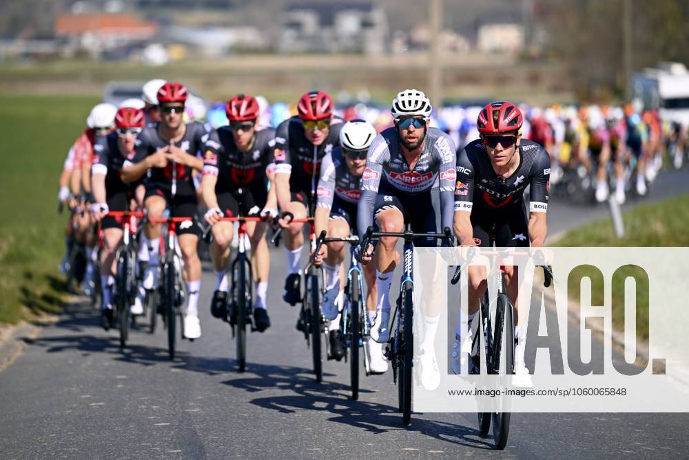 Danilith Nokere Koerse 2025 cycling race NOKERE, BELGIUM - MARCH 19 : rider of Tudor Pro Cycling Team and rider of Alpecin-Deceuninck during the Men Elite UCI 1.Pro 78th Danilith Nokere Koerse cycling race with start in Deinze and finish in Nokere (188,2 km) on March 19, 2025 in Nokere, Belgium, 19 03 2025 ( Motordriver Rodrique Verfaillie & Nokere Belgium