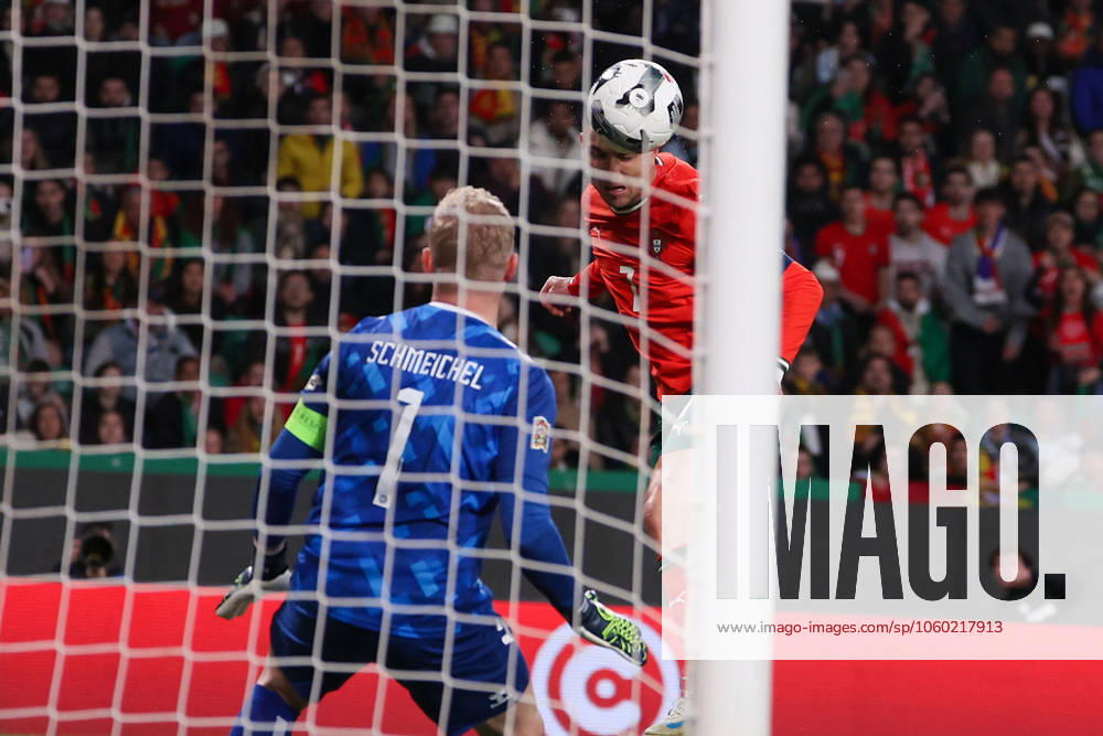 2025 03 23 Portugal, Lisbon Estadio Jose Alvalade UEFA Nations League 2025 Quarter finals Portugal Denmark v l , Cristiano Ronaldo Portugal header, goalkeeper Kasper Schmeichel Denmark