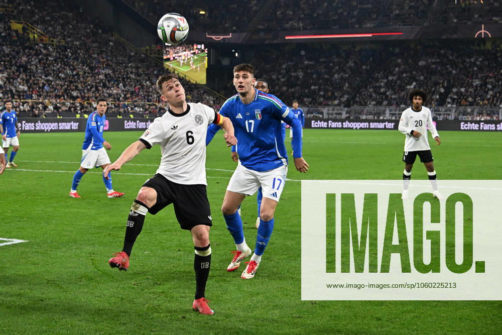 Football UEFA Nations League, Germany Italy v l Joshua Kimmich German National Football Team DFB Matteo Ruggeri Italy duel, action, action, battle for the ball Dortmund