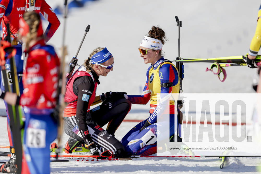 Biathlon World Cup in Holmenkollen 2025 Oslo 20250323 Winner Franziska Preu? from Germany gives third place winner Lou Jeanmonnot from France a hug after the women s mass start 12 5 km biathlon in the World Cup in Holmenkollen on Sunday Photo Thomas Andersen NTB Oslo Norway RESTRICTED USE FOR BETTING COMPANIES