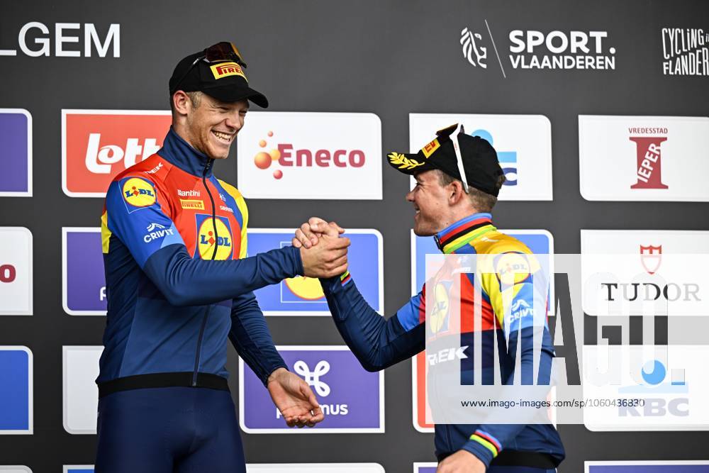 Italian Jonathan Milan of Lidl-Trek and Danish Mads Pedersen of Lidl-Trek celebrate on the podium after winning the men elite Gent-Wevelgem - In Flanders Fields one day cycling race, 250.3 km from Ieper to Wevelgem, Sunday 30 March 2025. JASPERxJACOBS x117247258x