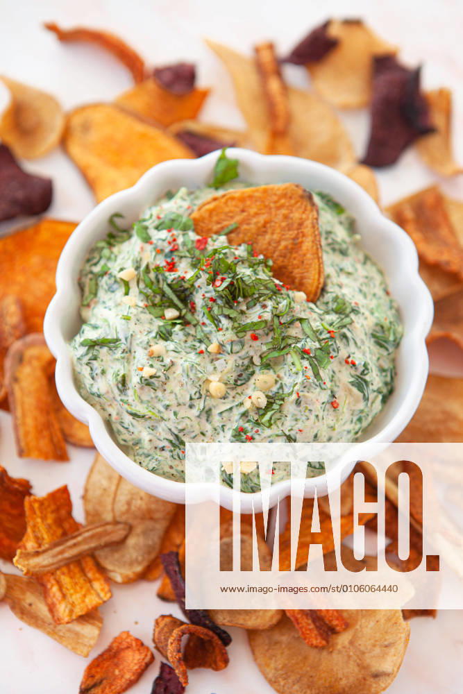 Key spinach dip with crispy chips of various vegetables 1079706267