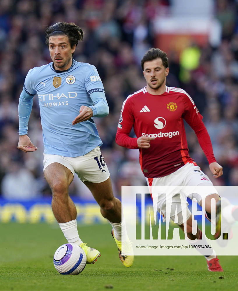 Manchester, England, 6th April 2025. Jack Grealish of Manchester City runs ahead of Mason Mount of Manchester United, ManU during the Manchester United vs Manchester City Premier League match at Old Trafford, Manchester. Picture credit should read: Andrew Yates Sportimage . SPI_043_AY_United_City SPI-3814-0044