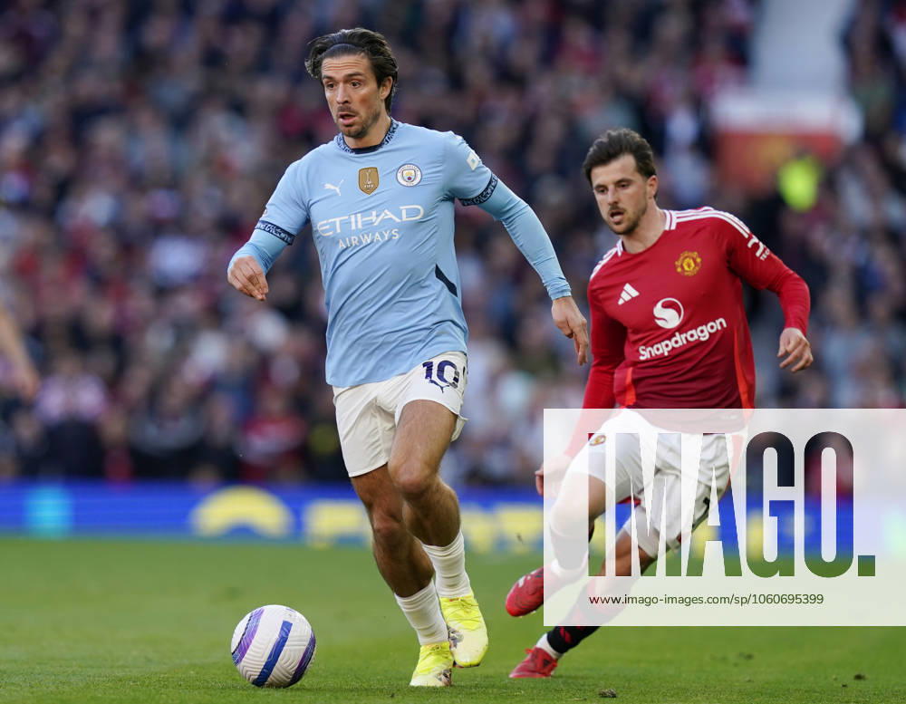 Manchester, England, 6th April 2025. Jack Grealish of Manchester City runs ahead of Mason Mount of Manchester United, ManU during the Manchester United vs Manchester City Premier League match at Old Trafford, Manchester. Picture credit should read: Andrew Yates Sportimage . SPI_044_AY_United_City SPI-3814-0045