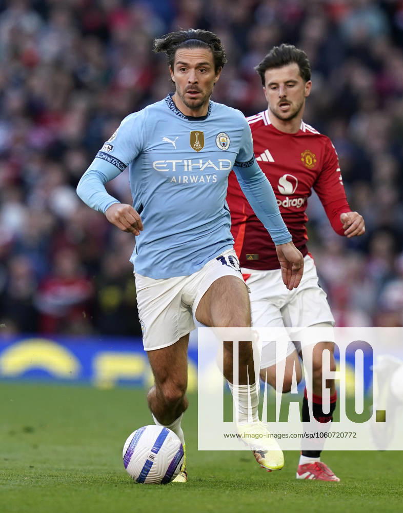 Manchester, England, 6th April 2025. Jack Grealish of Manchester City (L) is challenged by Mason Mount of Manchester United, ManU during the Manchester United vs Manchester City Premier League match at Old Trafford, Manchester. Picture credit should read: Andrew Yates Sportimage . SPI_099_AY_United_City SPI-3814-0100