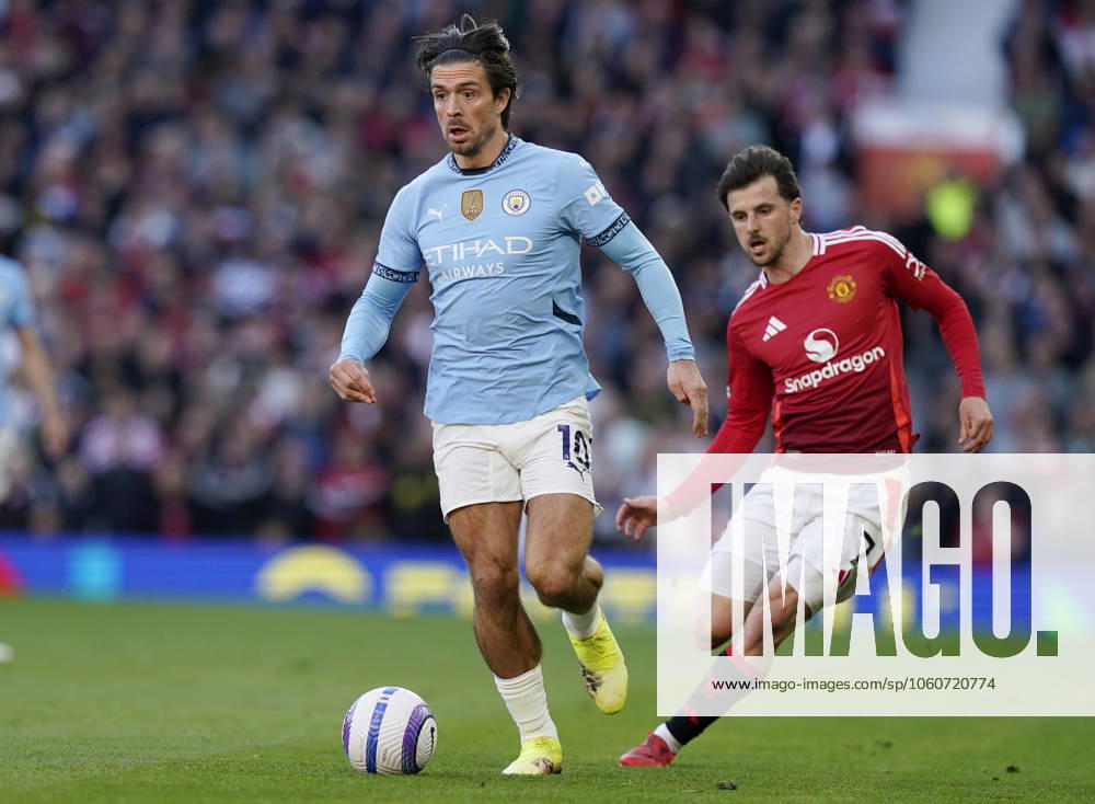 Manchester, England, 6th April 2025. Jack Grealish of Manchester City (L) is challenged by Mason Mount of Manchester United, ManU during the Manchester United vs Manchester City Premier League match at Old Trafford, Manchester. Picture credit should read: Andrew Yates Sportimage . SPI_101_AY_United_City SPI-3814-0102