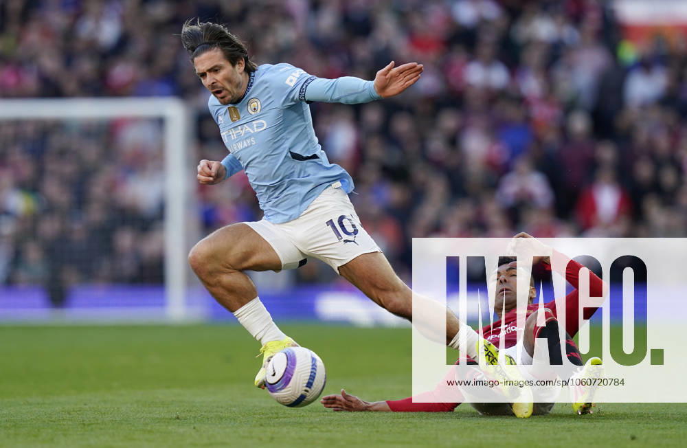Manchester, England, 6th April 2025. Jack Grealish of Manchester City (L) is challenged by Casemiro of Manchester United, ManU during the Manchester United vs Manchester City Premier League match at Old Trafford, Manchester. Picture credit should read: Andrew Yates Sportimage . SPI_110_AY_United_City SPI-3814-0111