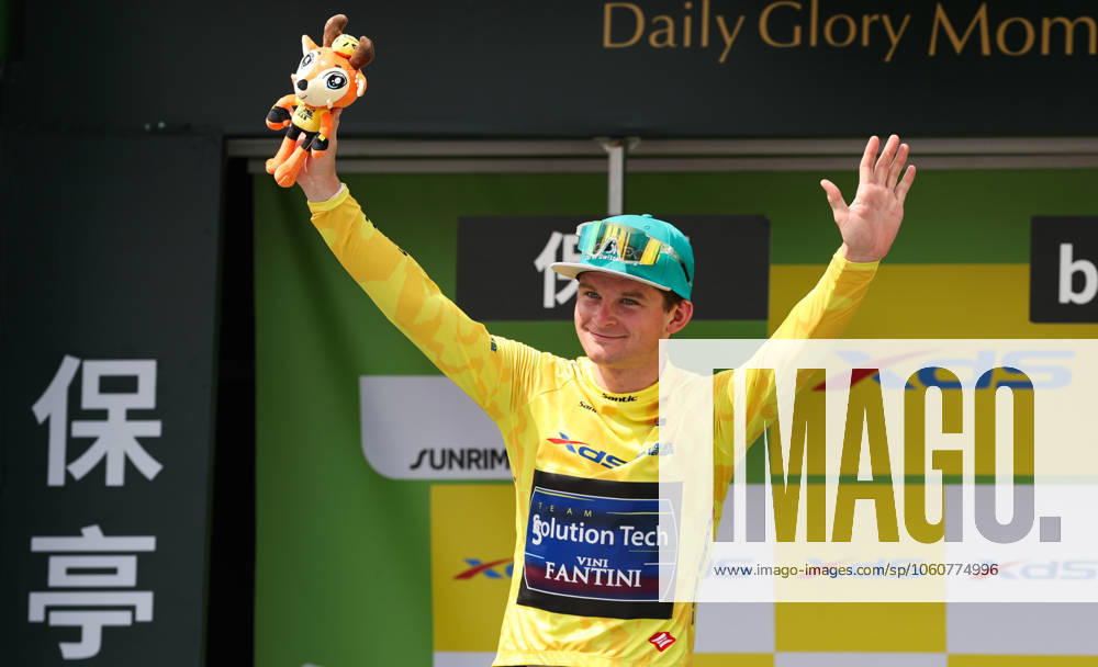 (250409) -- BAOTING, April 9, 2025 -- Kyrylo Tsarenko of Solution Tech Vini Fantini celebrates in the yellow jersey during the awarding ceremony after Stage 3 at the 16th Tour of Hainan cycling race from Lingshui to Baoting, south China s Hainan Province, April 9, 2025. ) (SP)CHINA-HAINAN-BAOTING-CYCLING-TOUR OF HAINAN (CN) YangxGuanyu