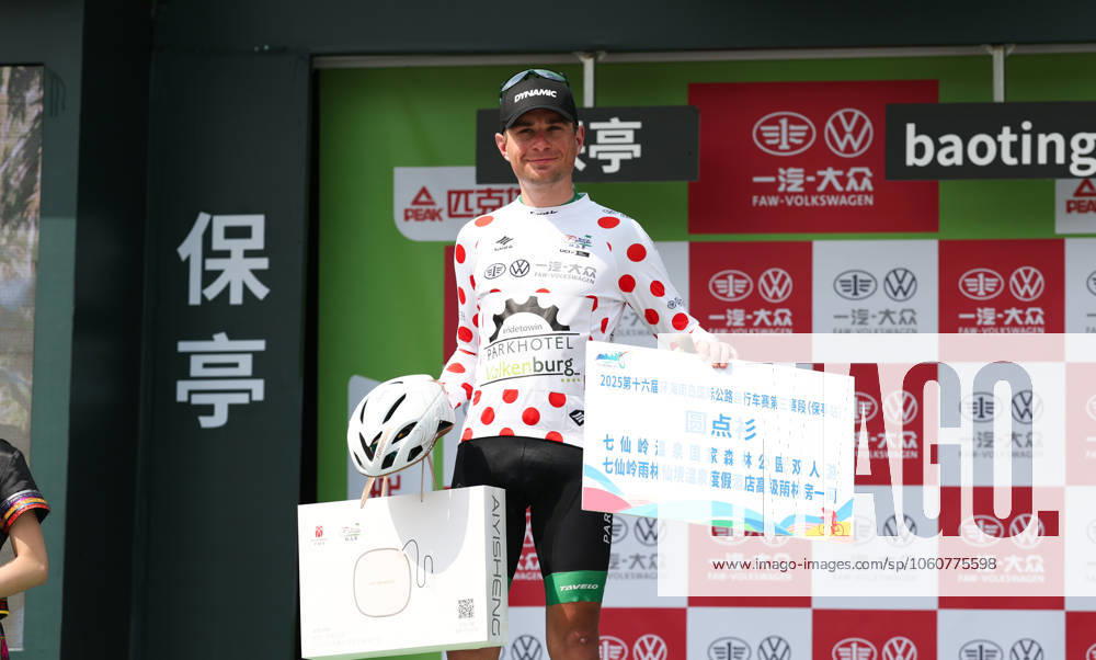 (250409) -- BAOTING, April 9, 2025 -- Nils Sinschek of Parkhotel Valkenburg celebrates in the polka-dot jersey during the awarding ceremony after Stage 3 at the 16th Tour of Hainan cycling race from Lingshui to Baoting, south China s Hainan Province, April 9, 2025. ) (SP)CHINA-HAINAN-BAOTING-CYCLING-TOUR OF HAINAN (CN) YangxGuanyu