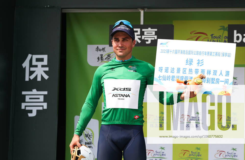 (250409) -- BAOTING, April 9, 2025 -- Matteo Malucelli of XDS Astana Team celebrates in the green jersey during the awarding ceremony after Stage 3 at the 16th Tour of Hainan cycling race from Lingshui to Baoting, south China s Hainan Province, April 9, 2025. ) (SP)CHINA-HAINAN-BAOTING-CYCLING-TOUR OF HAINAN (CN) YangxGuanyu
