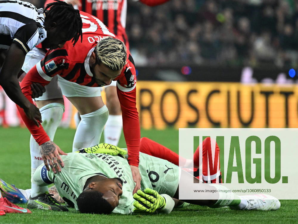 (250412) -- UDINE, April 12, 2025 -- AC Milan s goalkeeper Mike Maignan (bottom) lies on the pitch after colliding with his teammate during a Serie A football match between Udinese and AC Milan in Udine, Italy, April 11, 2025. (Photo by Xinhua) (SP)ITALY-UDINE-FOOTBALL-SERIE A-UDINESE VS AC MILAN AlbertoxLingria