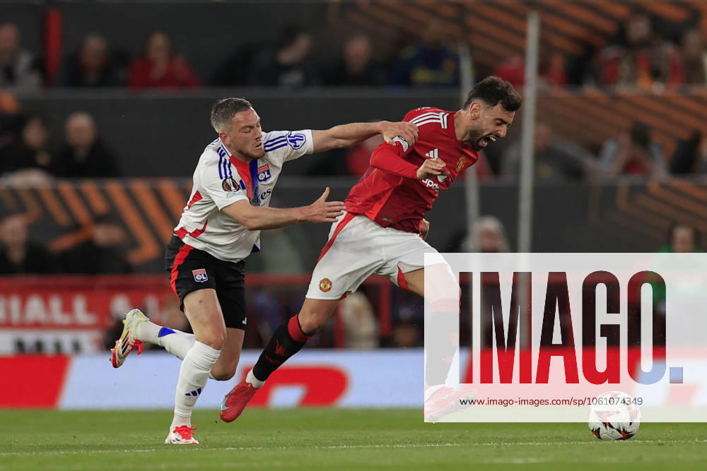 Manchester United, ManU v Olympique Lyonnais Europa League 17 04 2025. Quarter Final leg 2 of 2 Bruno Fernandes (8) of Manchester United is held back bu Jordan Veretout (7) of Olympique Lyonnais during the Europa League quarter final second leg match between Manchester United and Olympique Lyonnais at Old Trafford, Manchester, England on 17 April 2025. Manchester Old Trafford Greater Manchester England Editorial use only ,