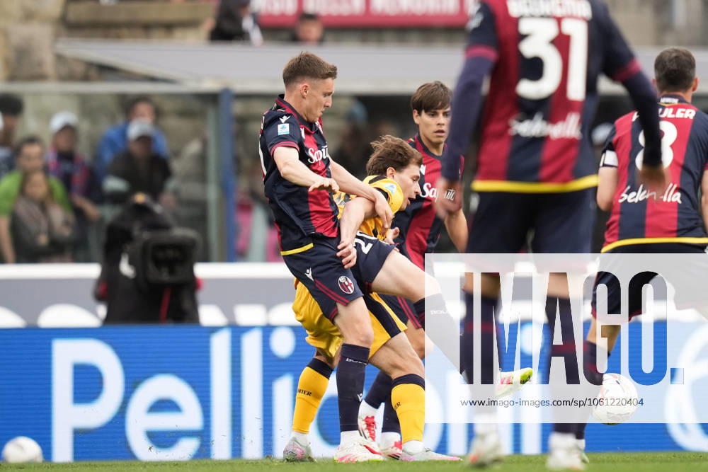 Inter MilanÕs Nicolo Barella fights for the ball with Bologna s Michel Aebischer during the Serie A Enilive 2024 2025 match between Bologna and Inter - Serie A Enilive at Renato DallÕAra Stadium - Soccer - Bologna, Italy - Sunday April 20, 2025