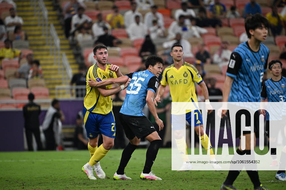 Al Nassr Club (KSA) vs Kawasaki Frontale (JPN) JEDDAH, SAUDI ARABIA - APRIL 30: LAPORTE feels pressure from MARUYAMA . Al Nassr Club (KSA) vs Kawasaki Frontale (JPN) during the AFC Champions League Elite match betweenc at alinma bank stadium at king abdullah sports city.