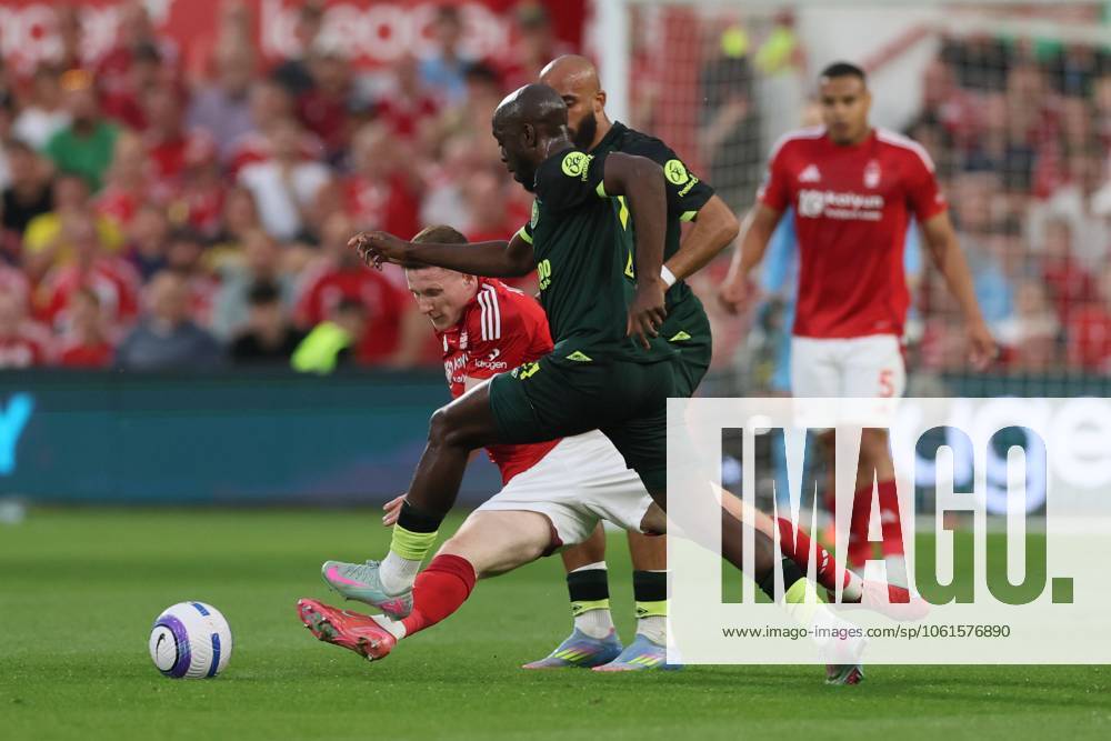 Elliot Anderson of Nottingham Forest fouls Yoane Wissa of Brentford and is booked Nottingham Forest v Brentford, Premier League, Football, City Ground, Nottingham, UK