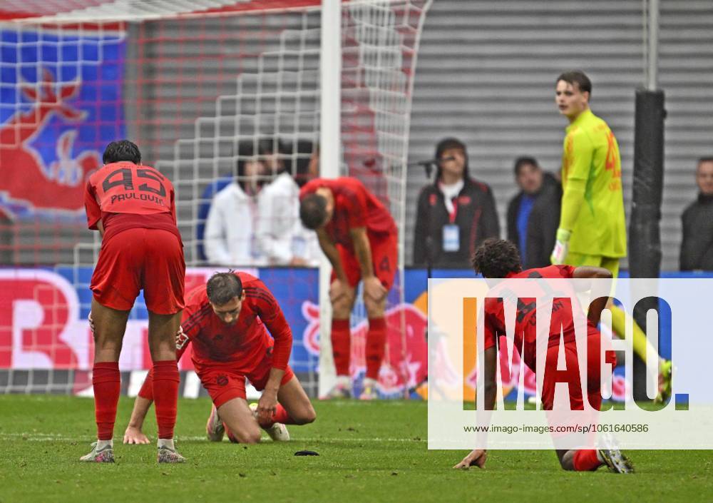 Soccer 1 Bundesliga 2024 2025, Matchday 32, RB Leipzig FC Bayern Munich, in the Red Bull Arena Leipzig, f l Aleksandar Pavlovic Bayern Munich , Leon Goretzka FC Bayern Munich , Goalkeeper Jonas Urbig FC Bayern Munich and Kingsley Coman FC Bayern Munich are beaten DFL and DFB regulations prohibit any use of photographs as image sequences and or quasi video