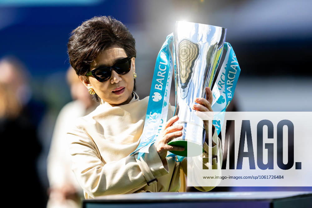Birmingham City Women v London City Lionesses Women s Championship 04 05 2025. London City Lionesses Owner Michele Kang places trophy on pedestal after the Women s Championship match between Birmingham City Women and London City Lionesses at the St Andrew s Stadium, Birmingham, England on 4 May 2025. Birmingham St Andrew s Stadium West Midlands England Editorial use only DataCo restrictions apply See www.football-dataco.com ,