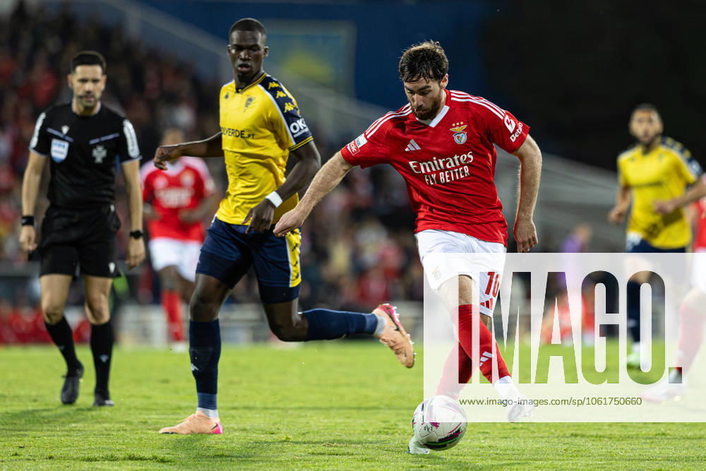 Estoril Praia SAD Vs SL Benfica in Cascais, Portugal - 03 May 2025 Orkun Kokcu of SL Benfica and Kevin Boma of Estoril Praia SAD seen in action during the Liga Portugal Betclic match between Estoril Praia SAD and SL Benfica at Estadio Antonio Coimbra da Mota. (Final score: Estoril Praia SAD 1 - 2 SL Benfica). Cascais Portugal