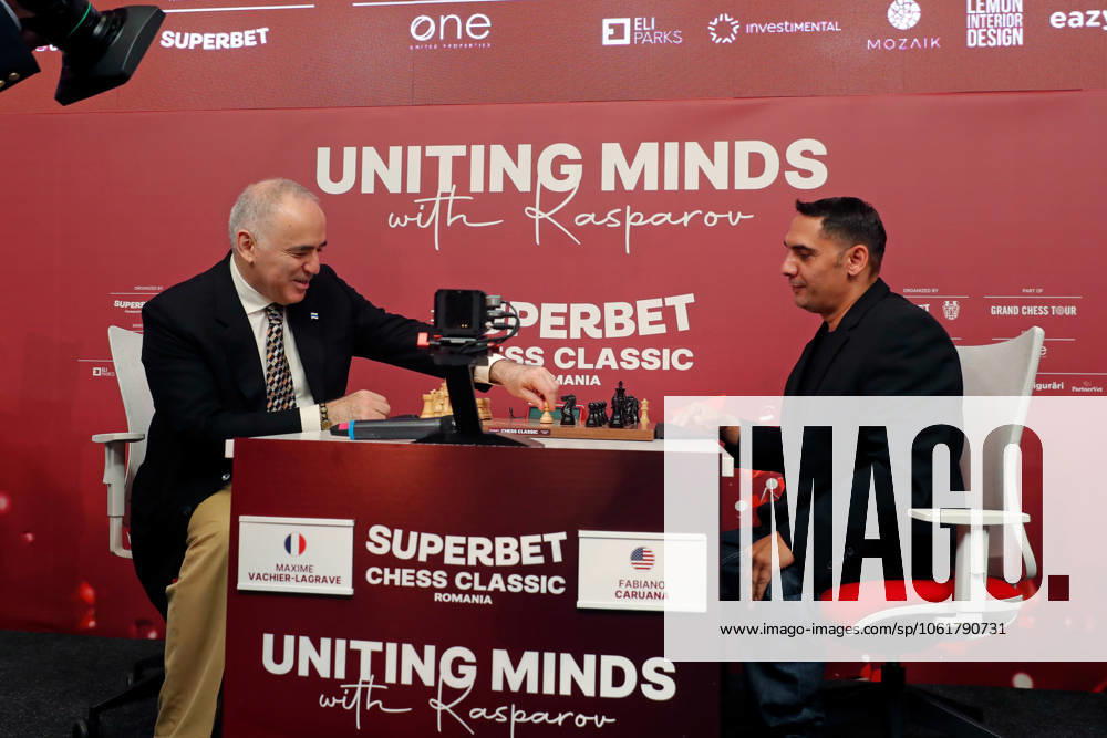 (250507) -- BUCHAREST, May 7, 2025 -- Former World Chess Champion Garry Kasparov (L) of Russia makes a move of an opening symbolic match against Constantin Bracon, a Romanian disabled person, during the official opening ceremony of the Grand Chess Tour 2025 tournament in Bucharest, Romania, May 6, 2025. (Photo by Xinhua) (SP)ROMANIA-BUCHAREST-GRAND CHESS TOUR 2025 CristianxCristel