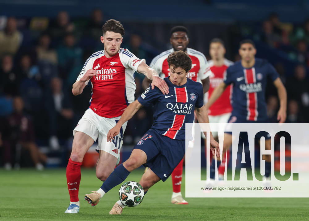 Paris, France, 7th May 2025. Joao Neves of Paris Saint-Germain and Declan Rice of Arsenal battle for the ball during the Paris Saint Germain vs Arsenal UEFA Champions League match at Le Parc des Princes, Paris. Picture credit should read: David Klein Sportimage . SPI_037_DK_PARIS_ST_GERMAIN_V_ARSENAL SPI-3913-0036