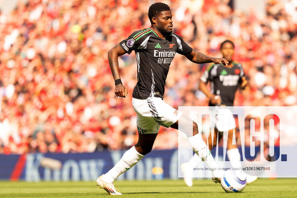 Liverpool FC v Arsenal FC - Premier League Thomas Partey of Arsenal plays during the Premier League match between Liverpool and Arsenal at Anfield in Liverpool, England, on May 11, 2025. Liverpool Merseyside United Kingdom