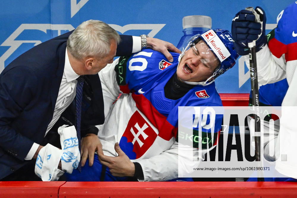 STOCKHOLM, SWEDEN 20250512 Slovakias Adam Sykora 10 is tended to after hurt his hand during the IIHF Ice Hockey World Championship group A match between Austria and Slovakia at Avicii Arena in Stockholm, Sweden, on May 12, 2025 STOCKHOLM SWEDEN