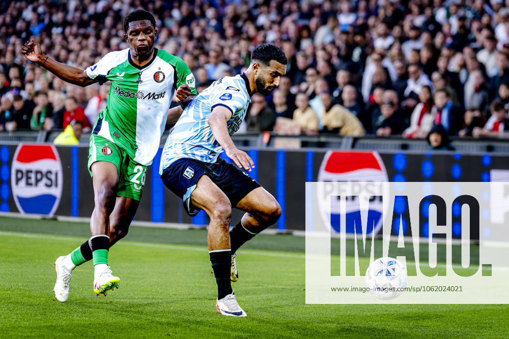 Feyenoord Rotterdam midfielder Givairo Read, RKC midfielder Yassin Oukili during the match Feyenoord RKC at the Feyenoord stadium De Kuip for the Dutch Eredivisie season 2024 2025 in ROTTERDAM, Netherlands on 14 may 2025, photo by Marcel van Dorst EYE4images DeFodi Images
