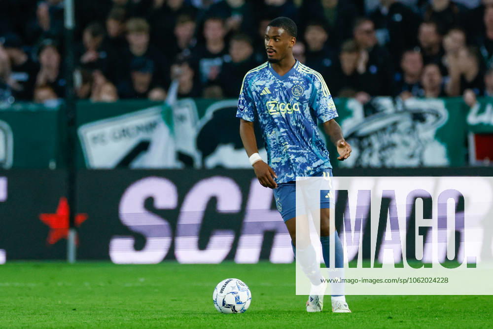 Jorrel Hato of Ajax dribbles with the ball , Eredivisie, FC Groningen v AFC Ajax, Euroborg, May 14, 2025, Groningen, Netherlands.