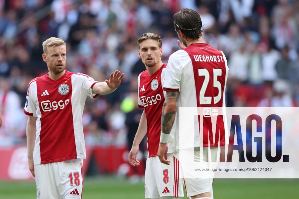 2025-05-18 AFC Ajax v FC Twente - Dutch Eredivisie AMSTERDAM, NETHERLANDS - MAY 18: Davy Klaassen of AFC Ajax, Kenneth Taylor of AFC Ajax, Wout Weghorst of AFC Ajax celebrating their teams second goal, the 2-0 during the Dutch Eredivisie match between AFC Ajax and FC Twente at Johan Cruijff ArenA on May 18, 2025 in Amsterdam, Netherlands. Amsterdam Johan Cruijff ArenA Netherlands Content not available for redistribution in The Netherlands directly or indirectly through any third parties.