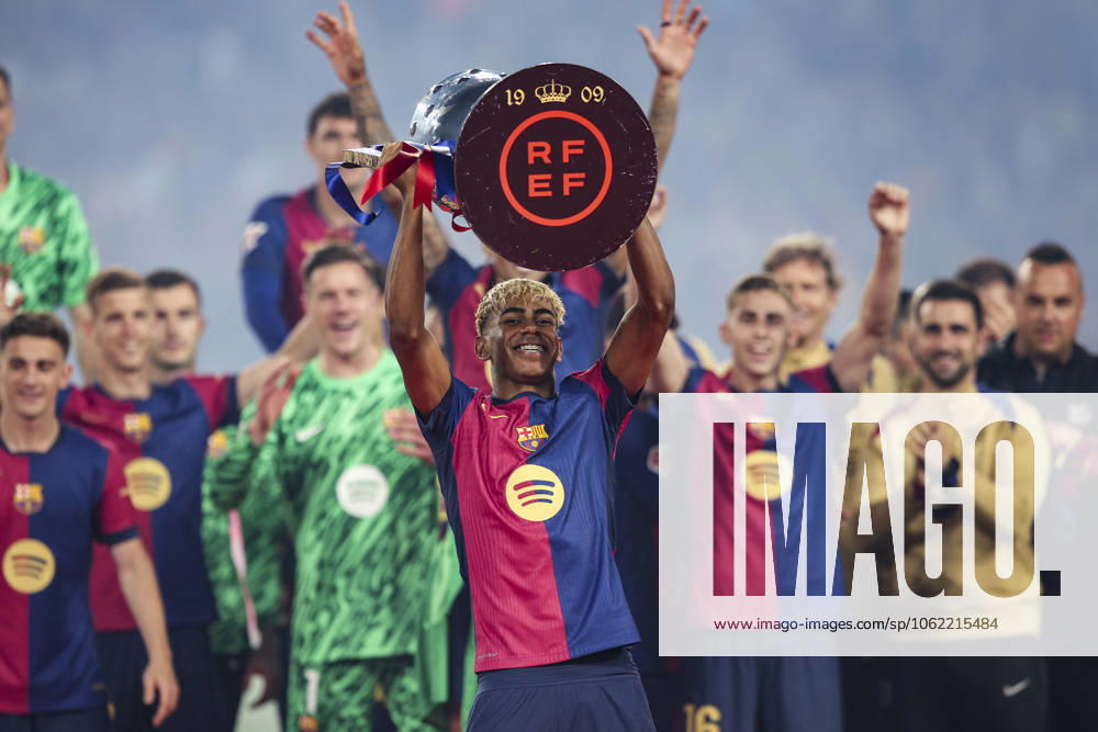 FC Barcelona, Barca v Villarreal CF - La Liga EA Sports Lamine Yamal of FC Barcelona raises the trophy in front of his teammates, celebrating the La Liga 2024 2025 championship during the La Liga EA Sports match between FC Barcelona and Villarreal CF at Olimpic Llus Companys in Barcelona, Spain, on May 18, 2025. Barcelona Spain