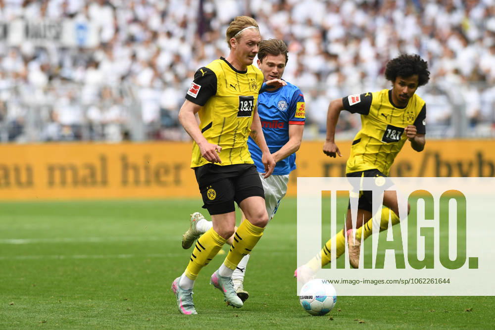 Julian Brandt Borussia Dortmund and Karim Adeyemi Borussia Dortmund in action, on the ball, individual action during the 1 Bundesliga match between Borussia Dortmund and Holstein Kiel, SIGNAL IDUNA PARK on May 17, 2025 in Dortmund, Germany Photo by Ralf Treese DeFodi Images Julian Brandt Borussia Dortmund and Karim Adeyemi Borussia Dortmund controls the ball during the Bundesliga match between Borussia Dortmund and Holstein Kiel at Signal Iduna Park on May 17, 2025 in Dortmund, Germany Photo by Ralf Treese DeFodi Images DFL regulations prohibit any use of photographs as image sequences and or quasi video Photo by Ralf Treese DeFodi Images