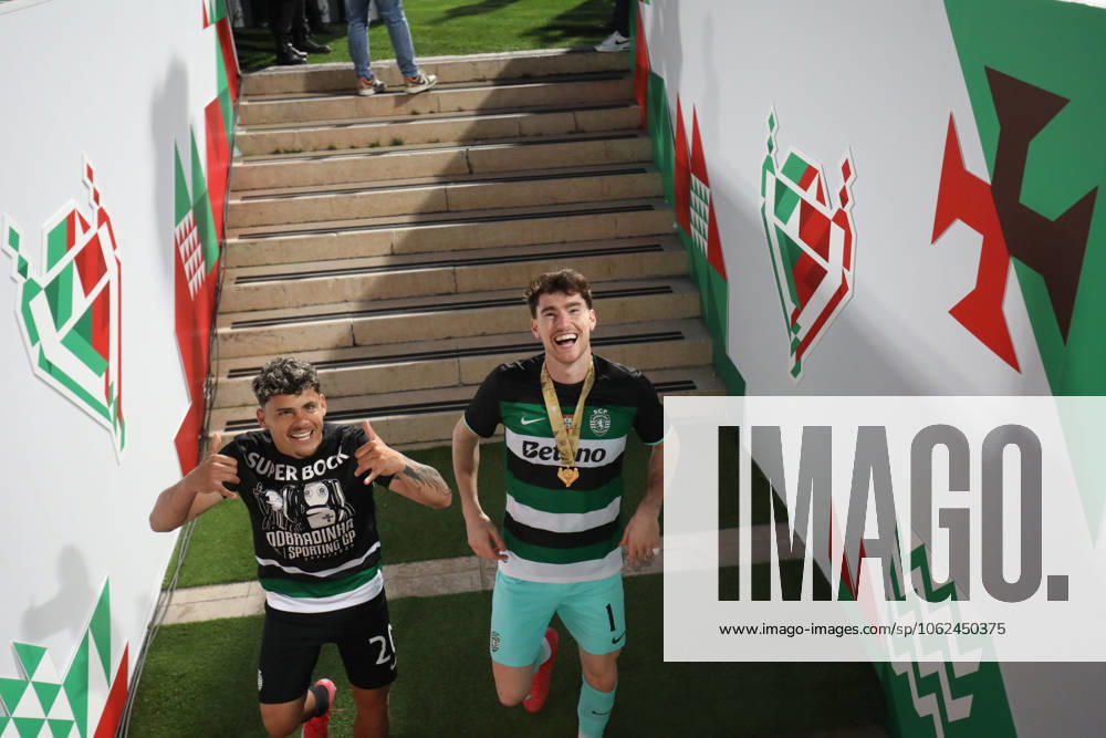 Sporting defender from Uruguay MAXI ARAUJO (20) and Sporting goalkeeper from Uruguay FRANCO ISRAEL (1) celebrating after winning the final of the of the Portuguese Cup between Benfica and Sporting at Estadio Nacional Caxias Portugal - ZUMAs359 20250525_zsp_s359_058