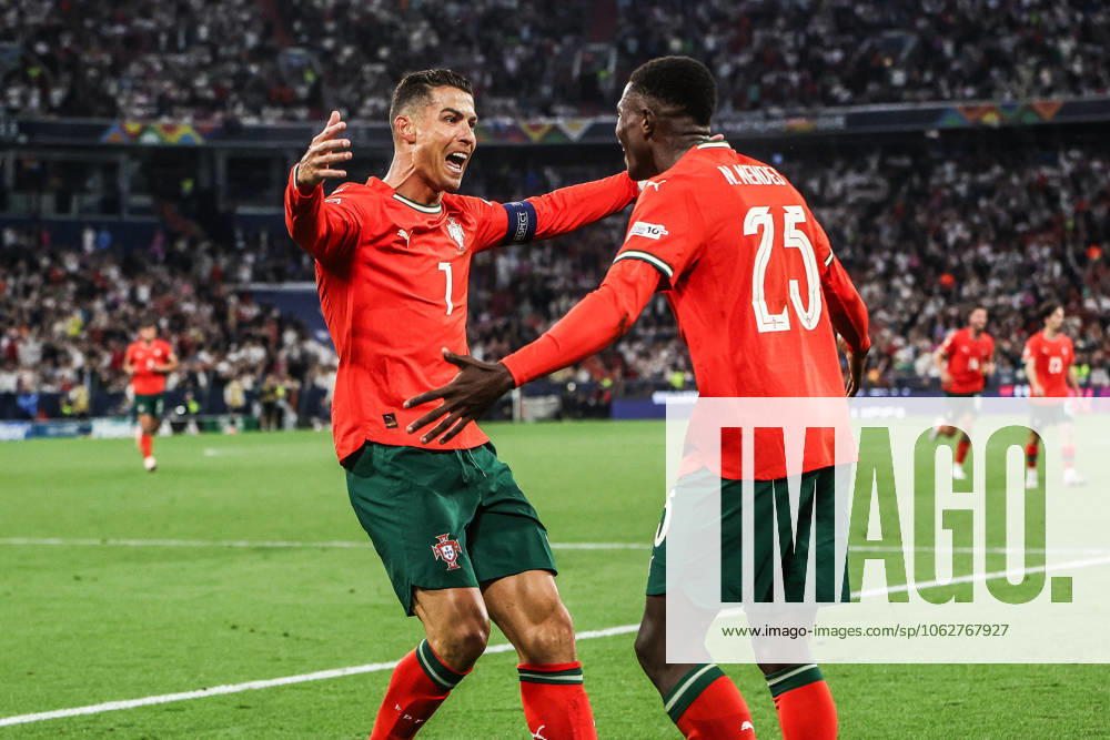 Sport, Football, UEFA Nations League season 2024 2025 Final Four semi-final Germany Portugal 04 06 2025, Munich Football Arena Goal celebration Portugal after the goal to 2 1 by Cristiano Ronaldo Portugal, 7 , the scorer celebrates with Nuno Mendes Portugal, 25 Munich Munich Football Arena Allianz Arena Bayern Germany
