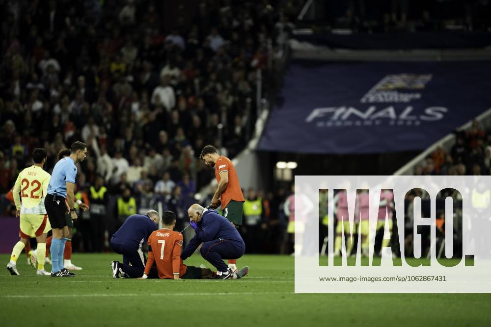 UEFA Nations League Final: Portugal vs Spain Cristiano Ronaldo of Portugal receives medical attention after sustaining an injury during the UEFA Nations League final against Spain at Allianz Arena in Munich.