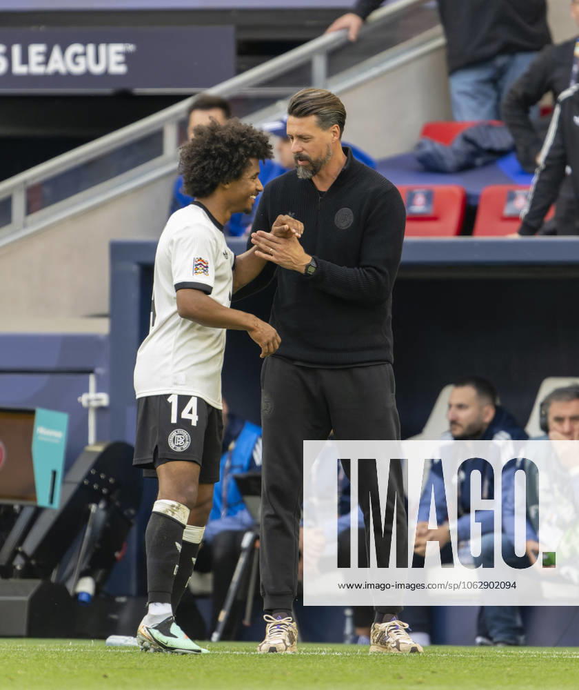 Football UEFA Nations League 2024 25, match for 3rd place, Germany France, in the MHP Arena Stuttgart, from left Karim Adeyemi Germany and co-coach Sandro Wagner Germany on the sidelines