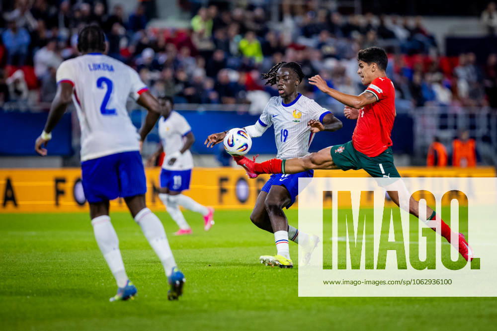 PORTUGAL U21, U 21 - FRANCE U21 Mateus Fernandes of Portugal and Ismael Doukoure of France during the UEFA European Under-21 Championship 2025 football match between Portugal U21 and France U21. Stadium Na Sihoti, Trencin, Slovakia, June 11, 2025. Photo by Branislav Racko
