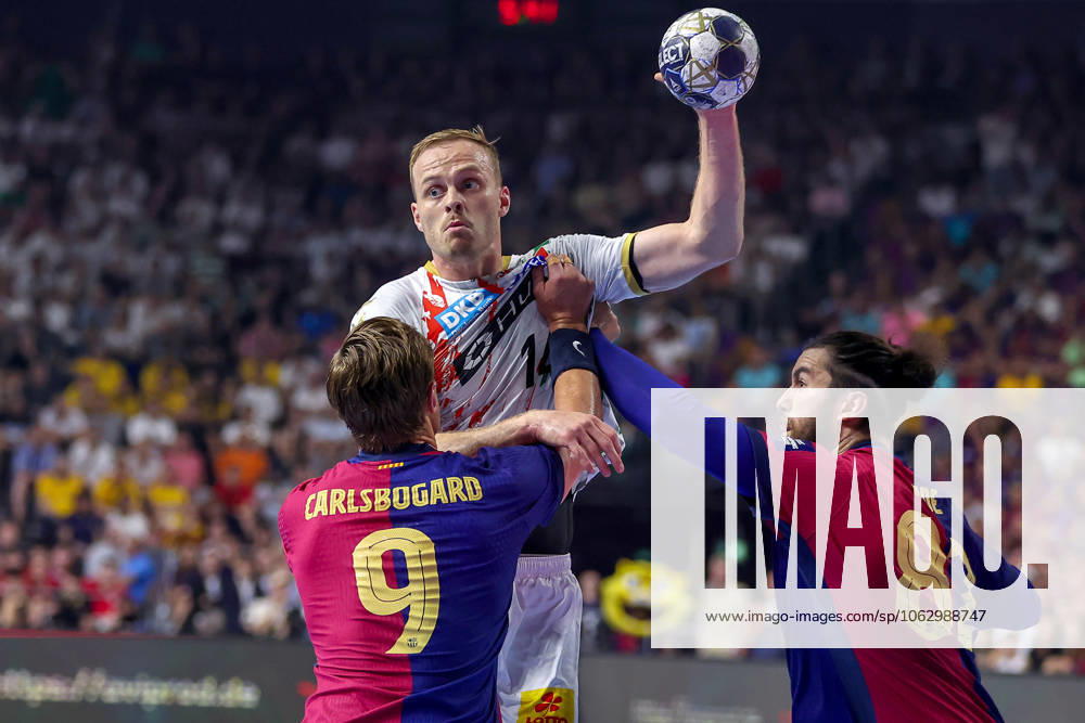 Handball, Semi-final TruckScout24 EHF FINAL4, LANXESS arena Cologne, FC Barcelona SC Magdeburg Omar Ingi Magnusson Magdeburg 14 vs Jonathan Carlsbogard Barca FC Barcelona ESP 09 Luis Diogo Sousa Frade Barca FC Barcelona ESP 82 North Rhine-Westphalia Germany