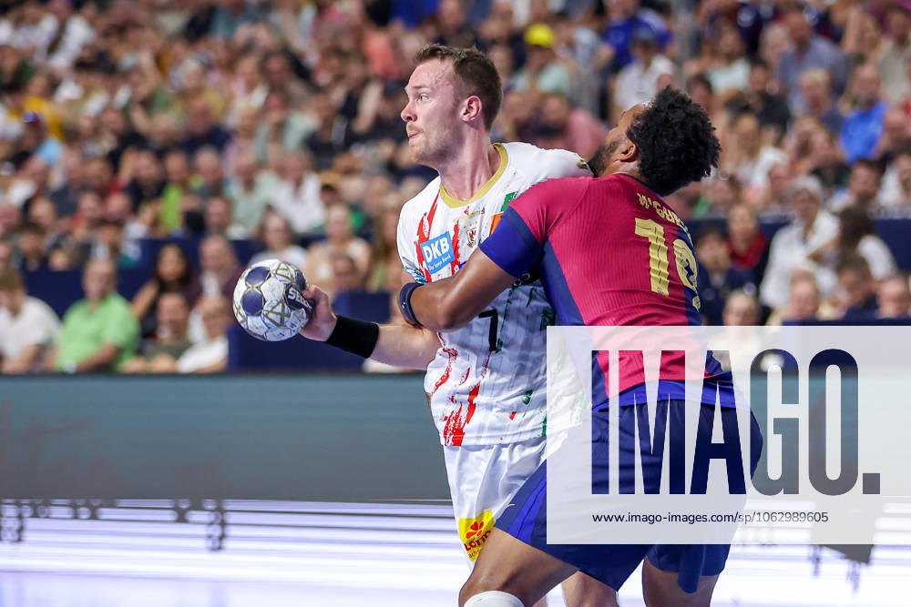 Handball, Semi-final TruckScout24 EHF FINAL4, LANXESS arena Cologne, FC Barcelona SC Magdeburg Felix Claar Magdeburg 07 vs Timothey N Guessan Barca FC Barcelona ESP 19 North Rhine-Westphalia Germany