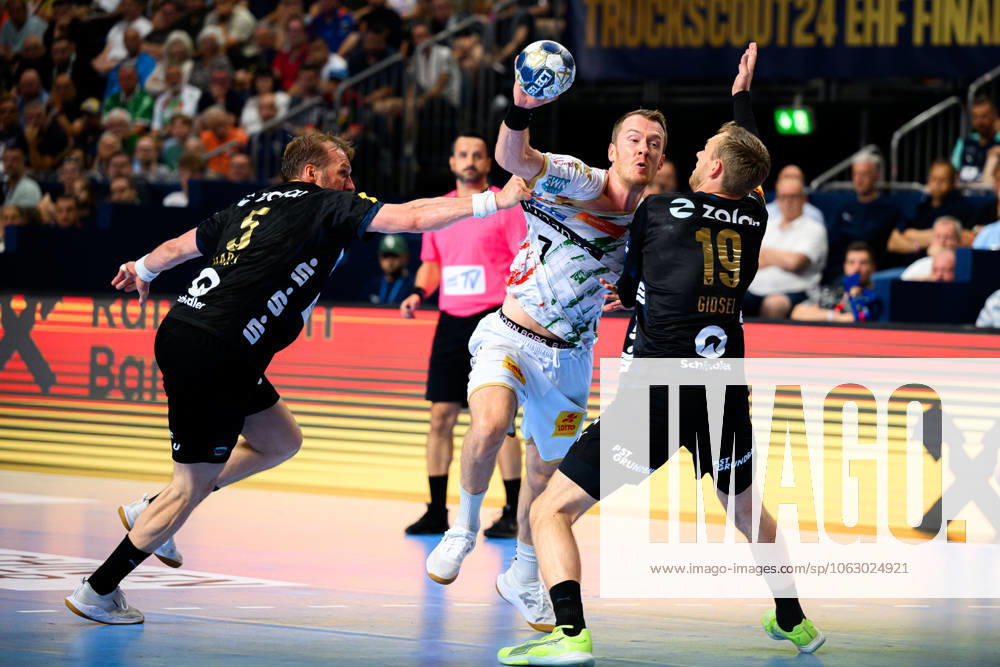 Cologne, Germany Handball EHF CL Final 4 Final Fuechse Berlin SC Magdeburg from left Max Darj Berlin , Felix Claar Magdeburg , Mathias Gidsel Berlin Cologne Lanxess Arena Nordrhein Westfalen Germany