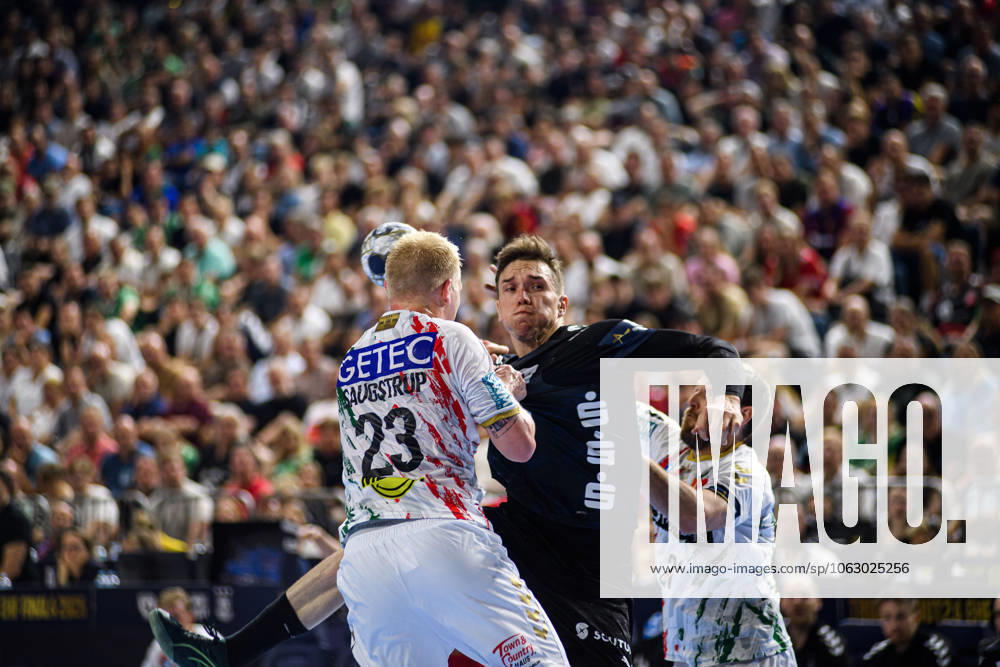 COLOGNE, GERMANY - 15 JUNE, 2025: Magnus Saugstrup Jensen, Mathias Gidsel - The final match of TruckScout24 EHF FINAL4 Fuchse Berlin vs SC Magdeburg at Lanxess Arena.