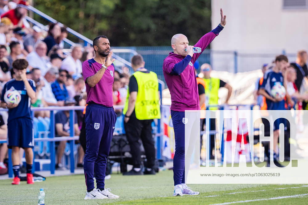 ENGLAND U21, U 21 - SLOVENIA U21 Head coach of England U21 Lee Carsley and assistant manager Ashley Cole during the UEFA European Under-21 Championship 2025 Group B football match between England U21 and Slovenia U21. Stadium Nitra Arena, Nitra, Slovakia, June 15, 2025. Photo by Branislav Racko