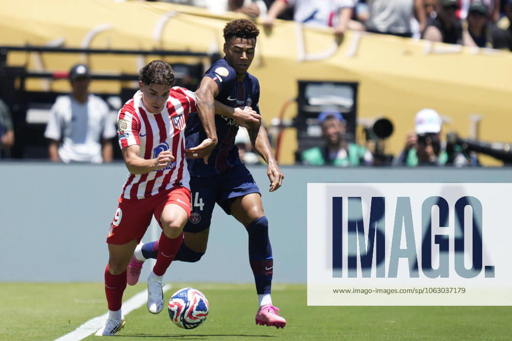 Paris Saint-Germain FC v Club Atletico de Madrid: Group B - FIFA Club World Cup 2025 PASADENA, CALIFORNIA - JUNE 15: Julian Alvarez centre-forward of Atletico de Madrid and Argentina and Desire Doue left winger of PSG and France compete for the ball during the FIFA Club World Cup 2025 group B match between Paris Saint-Germain FC and Club Atletico de Madrid at Rose Bowl Stadium on June 15, 2025 in Pasadena, California. Jose Hernandez Anadolu California United States. Editorial use only. Please get in touch for any other usage.