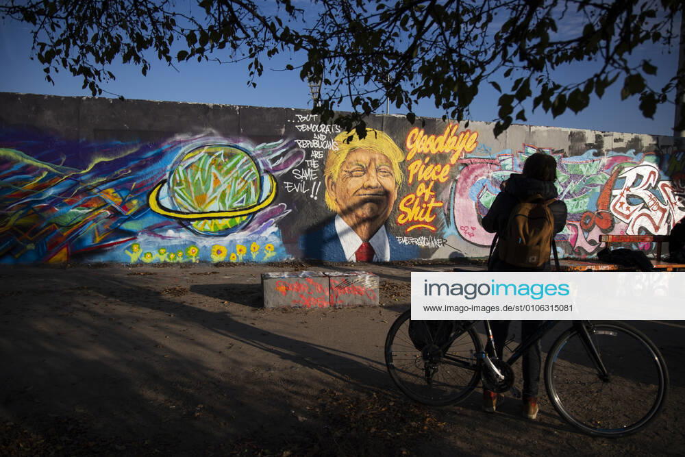 Graffiti by artist Eme Freethinker with picture of US President Donald Trump and writing Goodbye Piece of Shit in Mauerpark in Berlin on November 12, 2020 Donald Trump Graffiti in Berlin