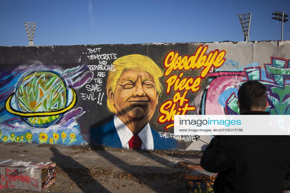 Graffiti by artist Eme Freethinker with picture of US President Donald Trump and writing Goodbye Piece of Shit in Mauerpark in Berlin on November 12, 2020 Donald Trump Graffiti in Berlin
